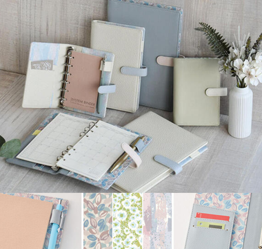 2026 system planner with fun patterned fabric covers in blue, green, and cream, featuring a monthly block layout and three sizes for students, office workers, and stationery enthusiasts