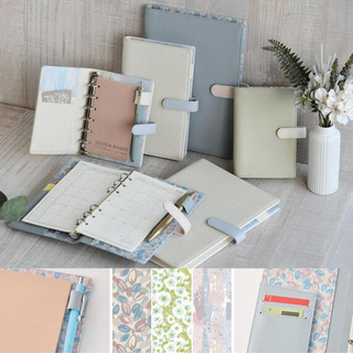 2026 system planner with fun patterned fabric covers in blue, green, and cream, featuring a monthly block layout and three sizes for students, office workers, and stationery enthusiasts