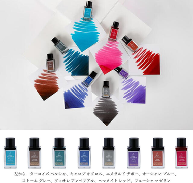 Close-up of 8 sparkling J. Herbin Anniversary Ink mini bottles with gold particles, perfect for fountain pens, journaling, testing ink colors, or gifting stationery lovers.