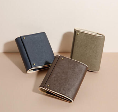 KNOX mini system notebook in Brown, Taupe, and Navy with compact, elegant design, magnetic closure, pen sleeve, and furoshiki-inspired wrap for journaling and daily use.