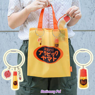 Arabic Yamato Capsule Toy collection featuring mini eco bags, pouches, and acrylic keychains inspired by Japan’s iconic Arabic Yamato glue bottle, perfect for stationery collectors and fans.