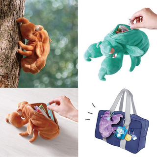 Cicada Pencil Case by Sun-Star Stationery standing upright on a desk and clipped to a bag; a funny and realistic insect-themed pen case that combines creativity and function.