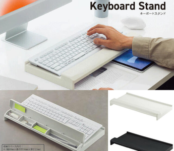 Smart keyboard stand placed on a desk, creating space for papers underneath while improving comfort and organization for a clean and tidy workspace.