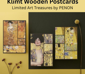 Close-up of PENON’s Klimt Wooden Postcards featuring Gustav Klimt’s famous artworks The Kiss, Judith I, and Adele Bloch-Bauer I, showcasing their embossed wooden texture and elegant gold design.