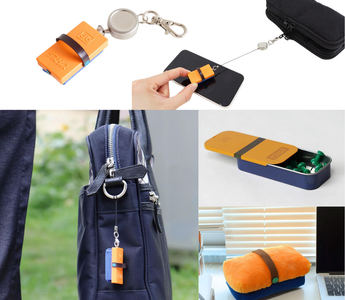 Retractable screen cleaner with extendable reel cord shaped like chalkboard eraser, compact microfiber phone and tablet cleaning cloth that clips to backpack, keys, or pencil case for convenient portable device screen cleaning without scratches